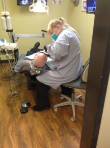 Dentist with patient